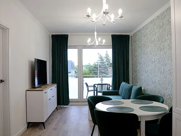 Apartament — salon z aneksem